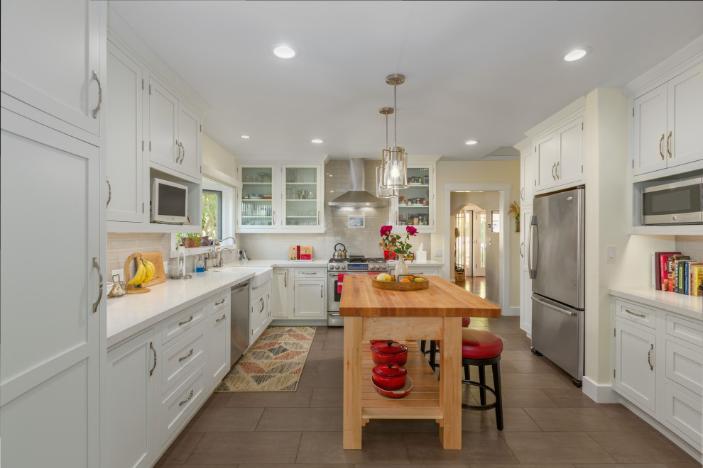 Design ideas for a transitional u-shaped separate kitchen in Santa Barbara.