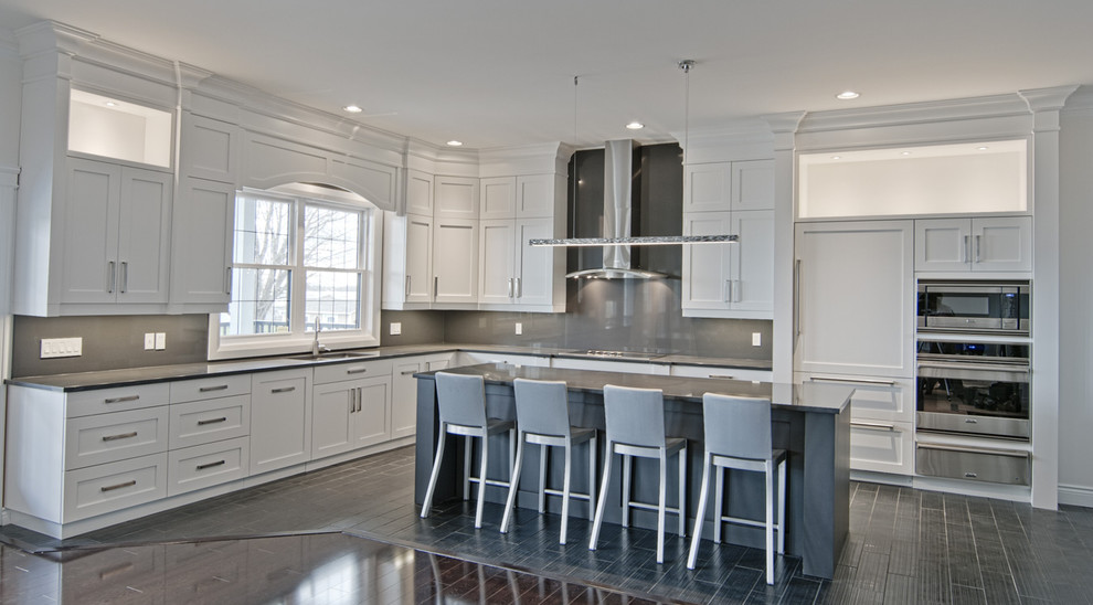 Example of a transitional kitchen design in Montreal