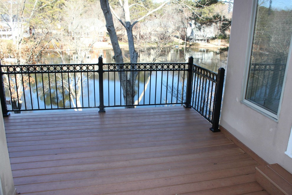Example of a large rooftop balcony deck design in Atlanta with no cover