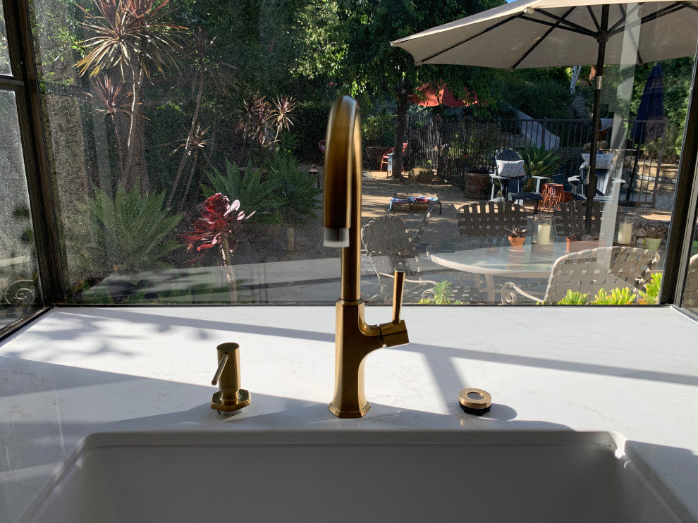 placement of soap dispenser kitchen sink