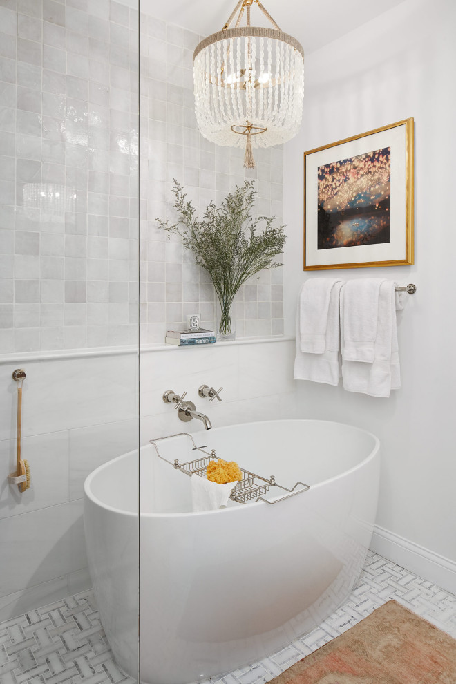 Design ideas for a mid-sized transitional master bathroom in Chicago with distressed cabinets, a freestanding tub, an open shower, a one-piece toilet, white tile, terra-cotta tile, white walls, marble floors, a vessel sink, engineered quartz benchtops, white floor and white benchtops.