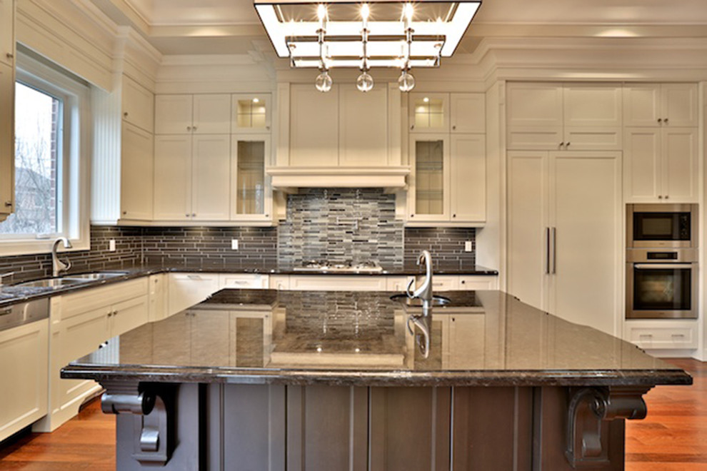 Example of a transitional kitchen design in Toronto