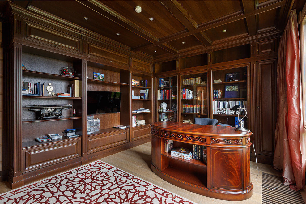 Design ideas for a traditional study room in Saint Petersburg with light hardwood floors and a freestanding desk.