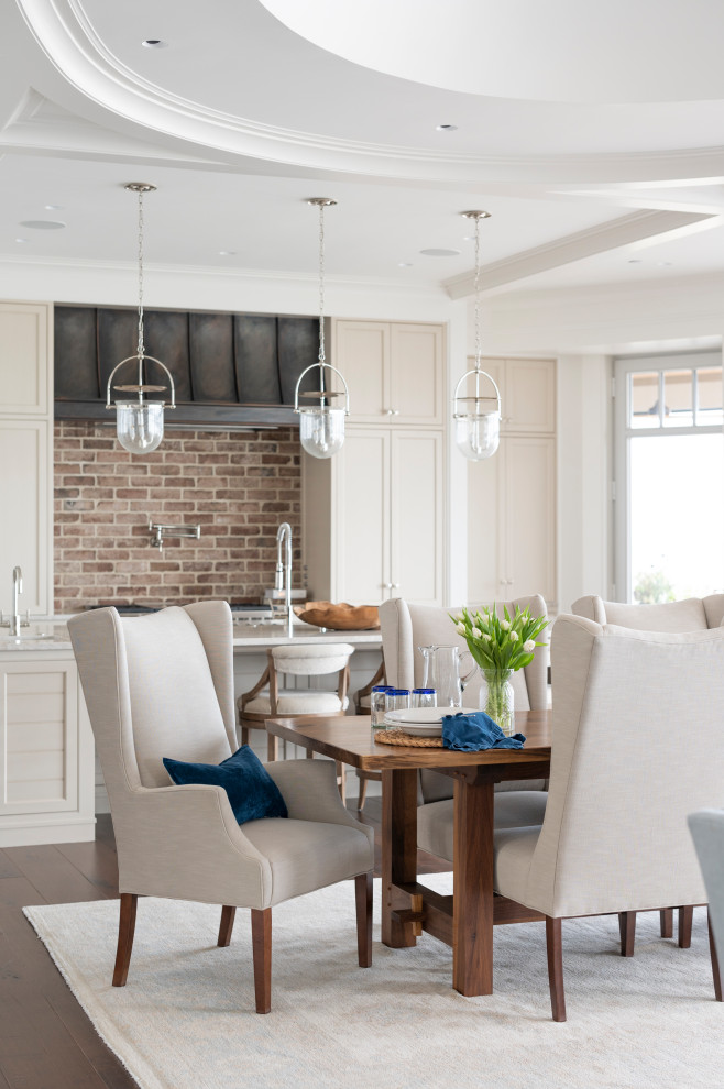 Nautical kitchen/dining room in Charleston with a coffered ceiling.