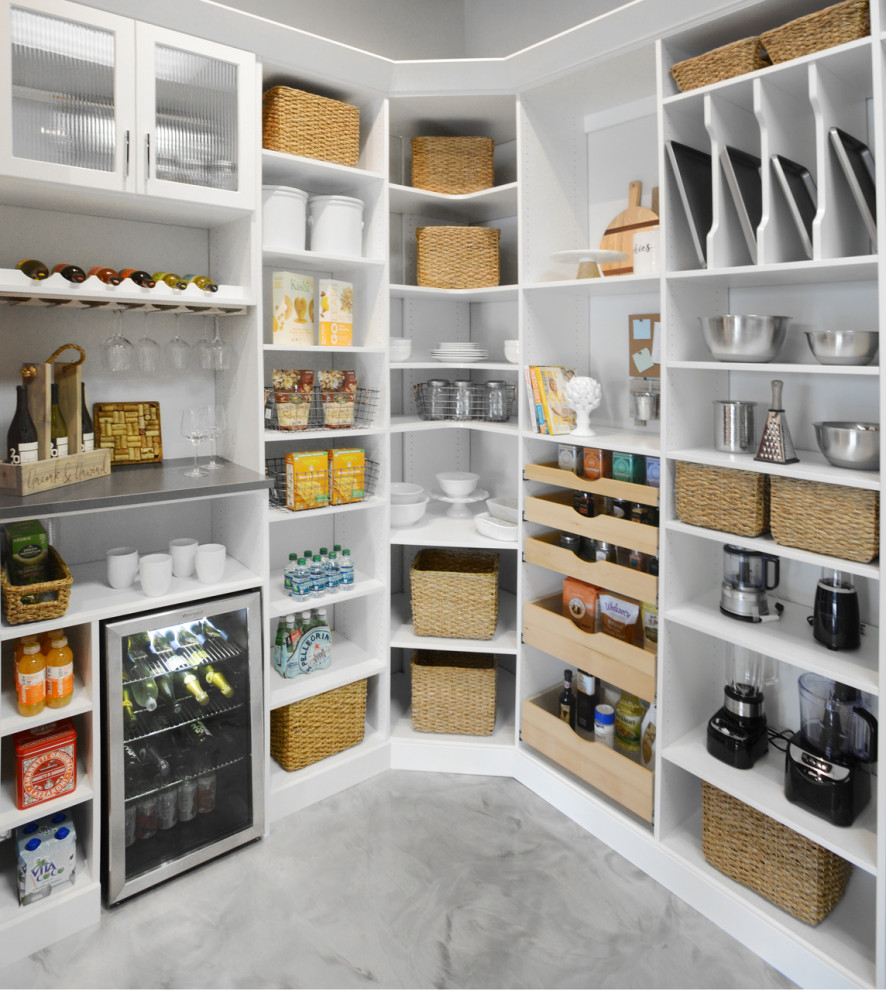 This is an example of a large contemporary kitchen pantry in Burlington.