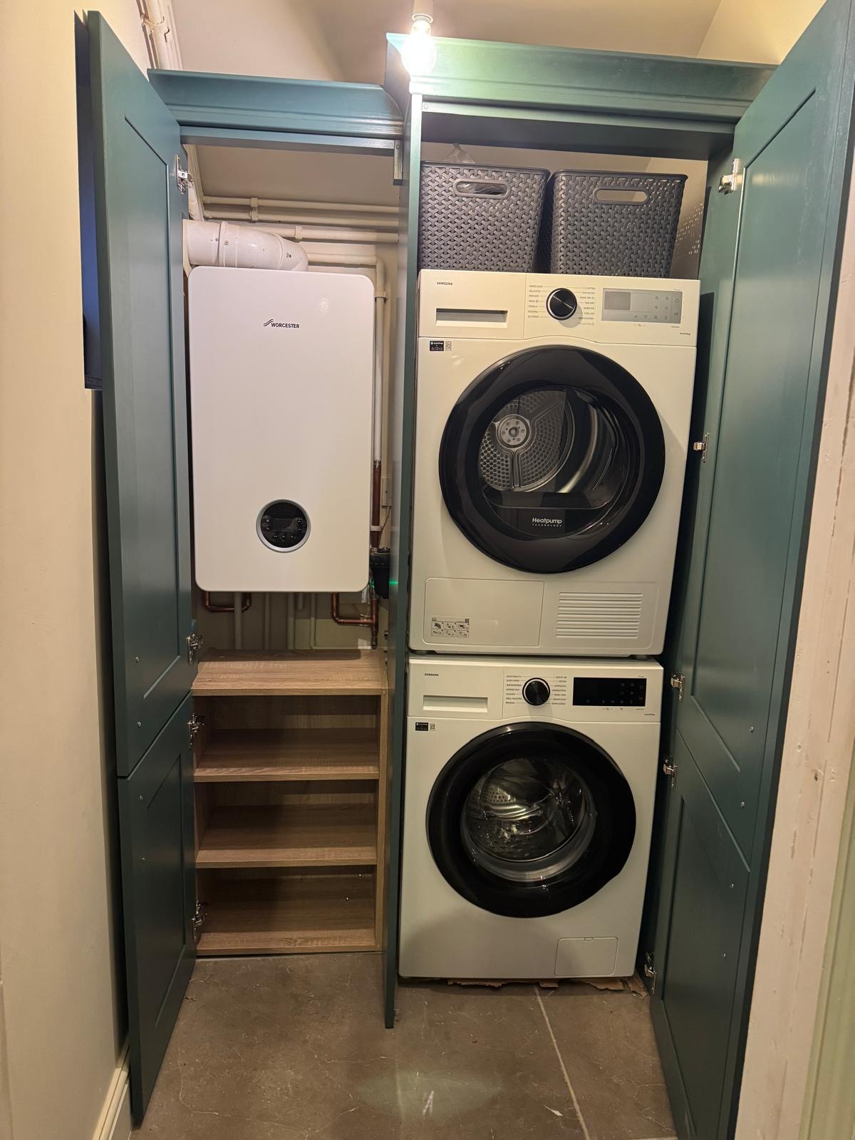 A Dark Coloured Gally Kitchen