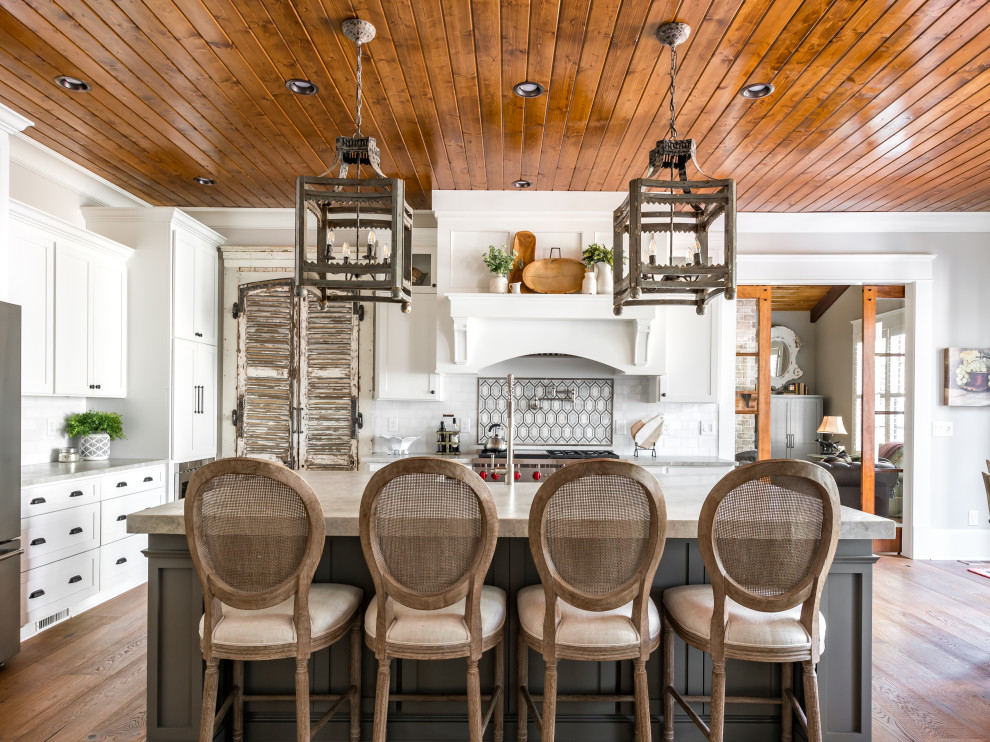 This is an example of an eclectic kitchen in Atlanta with wood.