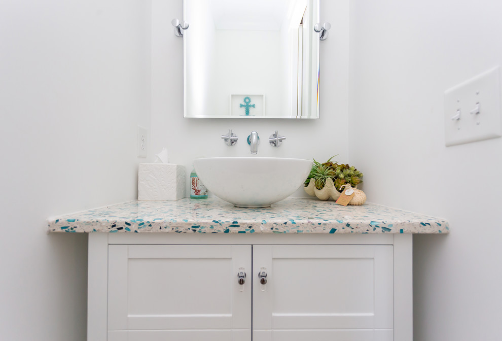 Design ideas for a small beach style 3/4 bathroom in Charleston with furniture-like cabinets, white cabinets, white walls, cement tiles, terrazzo benchtops, beige floor and multi-coloured benchtops.
