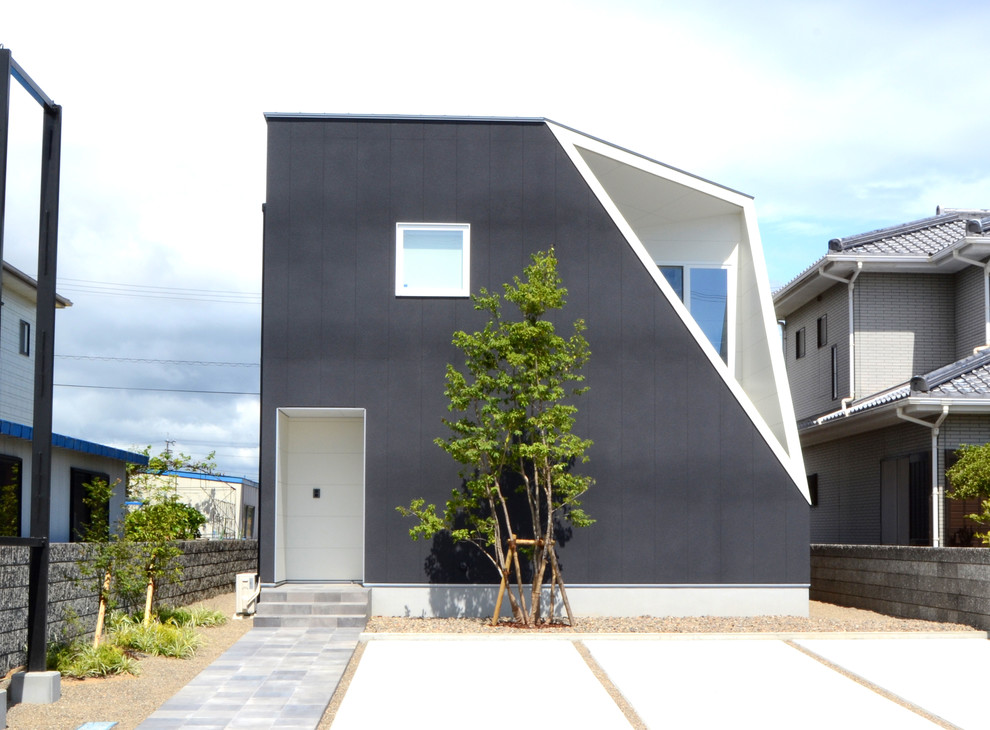 Design ideas for a contemporary grey house exterior.