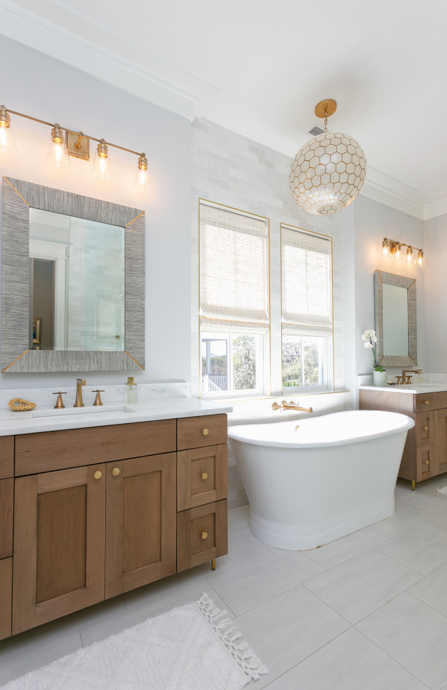 Mid-sized beach style master bathroom in Charleston with white cabinets, a corner shower, a two-piece toilet, glass tile, white walls, mosaic tile floors, an integrated sink, white floor, a hinged shower door, white benchtops, a shower seat, a single vanity, a freestanding vanity and shaker cabinets.