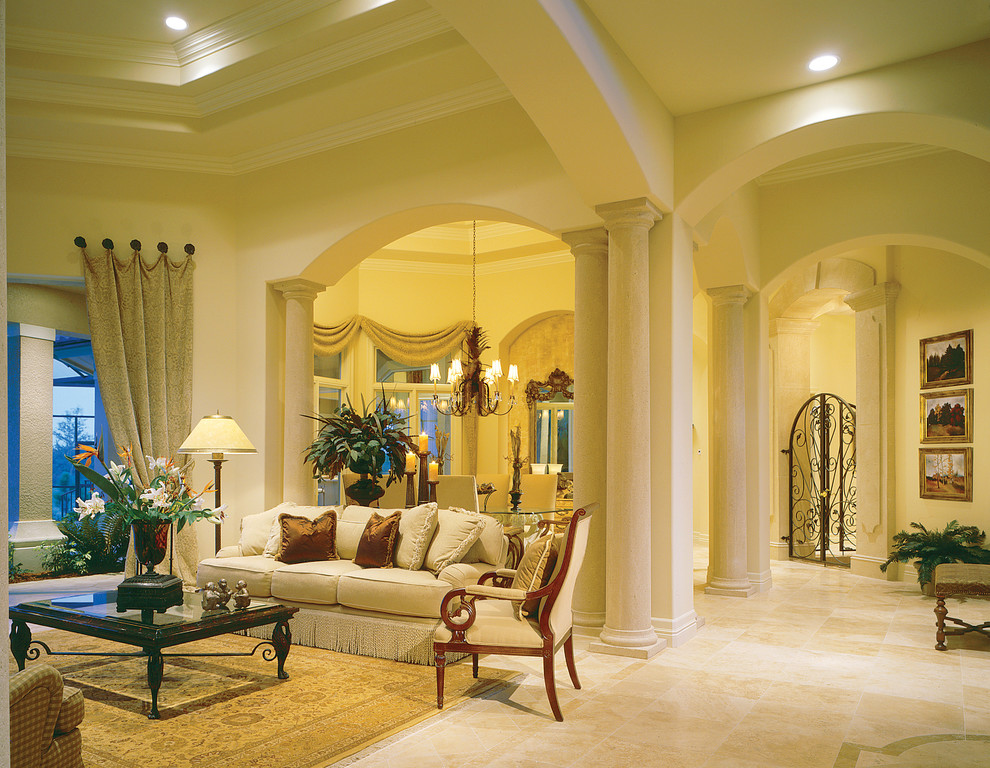 Large mediterranean formal enclosed living room in Miami with beige walls, travertine floors, no fireplace and no tv.