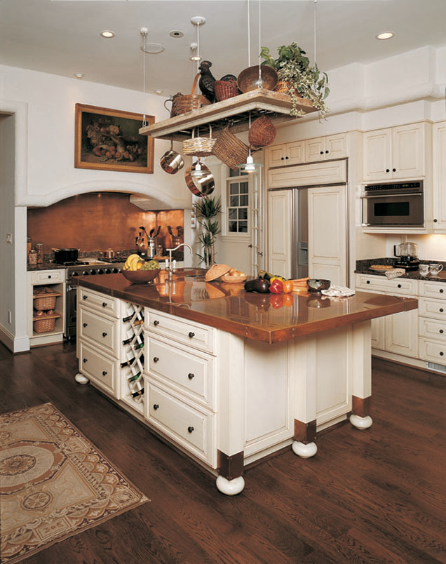 Inspiration for a traditional l-shaped kitchen pantry in Denver with an undermount sink, raised-panel cabinets, white cabinets, copper benchtops, brown splashback, stainless steel appliances, dark hardwood floors and with island.