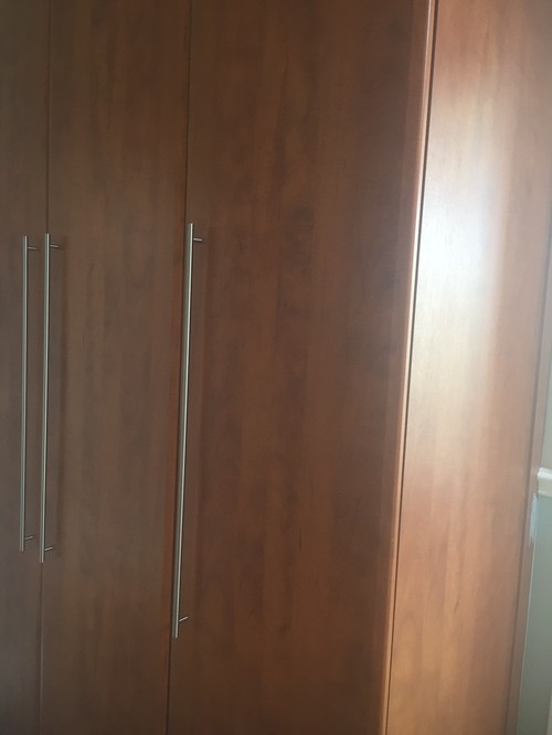Can I paint these dark Melamine wardrobes? would the paint chip?