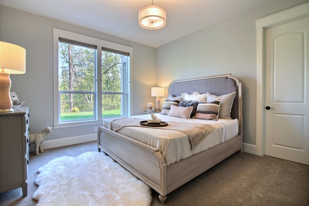Bedroom - large craftsman guest carpeted and beige floor bedroom idea in Portland with gray walls
