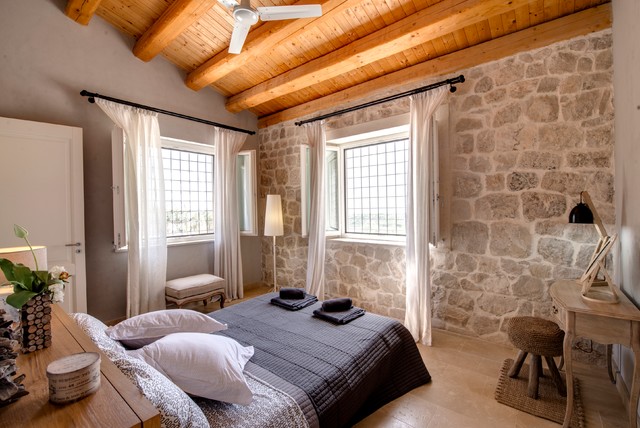 Rustic Master Bed medelhavsstil-sovrum
