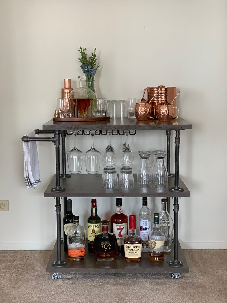 Inspiration for a small transitional single-wall bar cart in Chicago with carpet and brown floor.