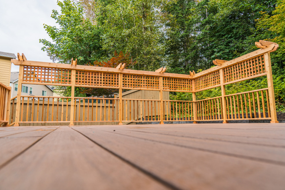Inspiration for a mid-sized backyard deck remodel in Seattle