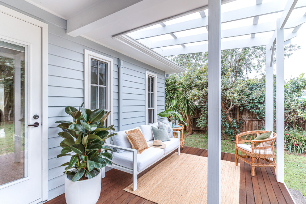 This is an example of a beach style verandah in Other.