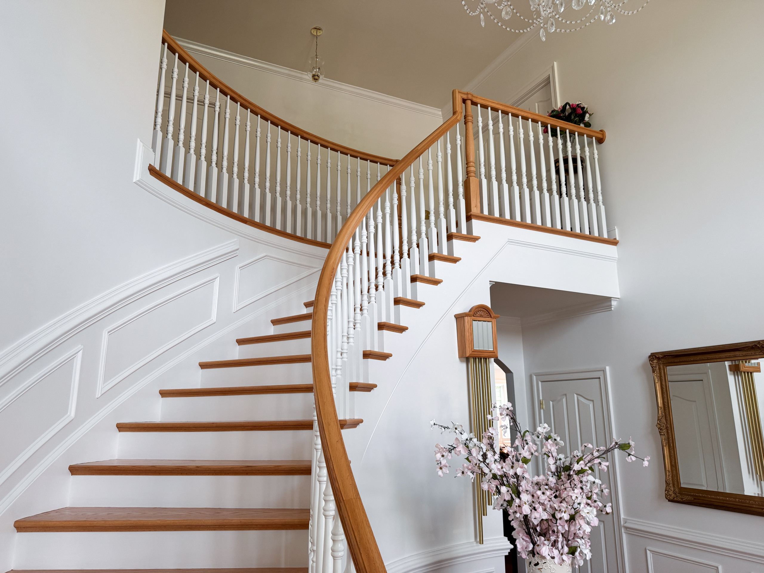 Project #161 | Curved Red Oak Foyer Staircase, 26 Years Later
