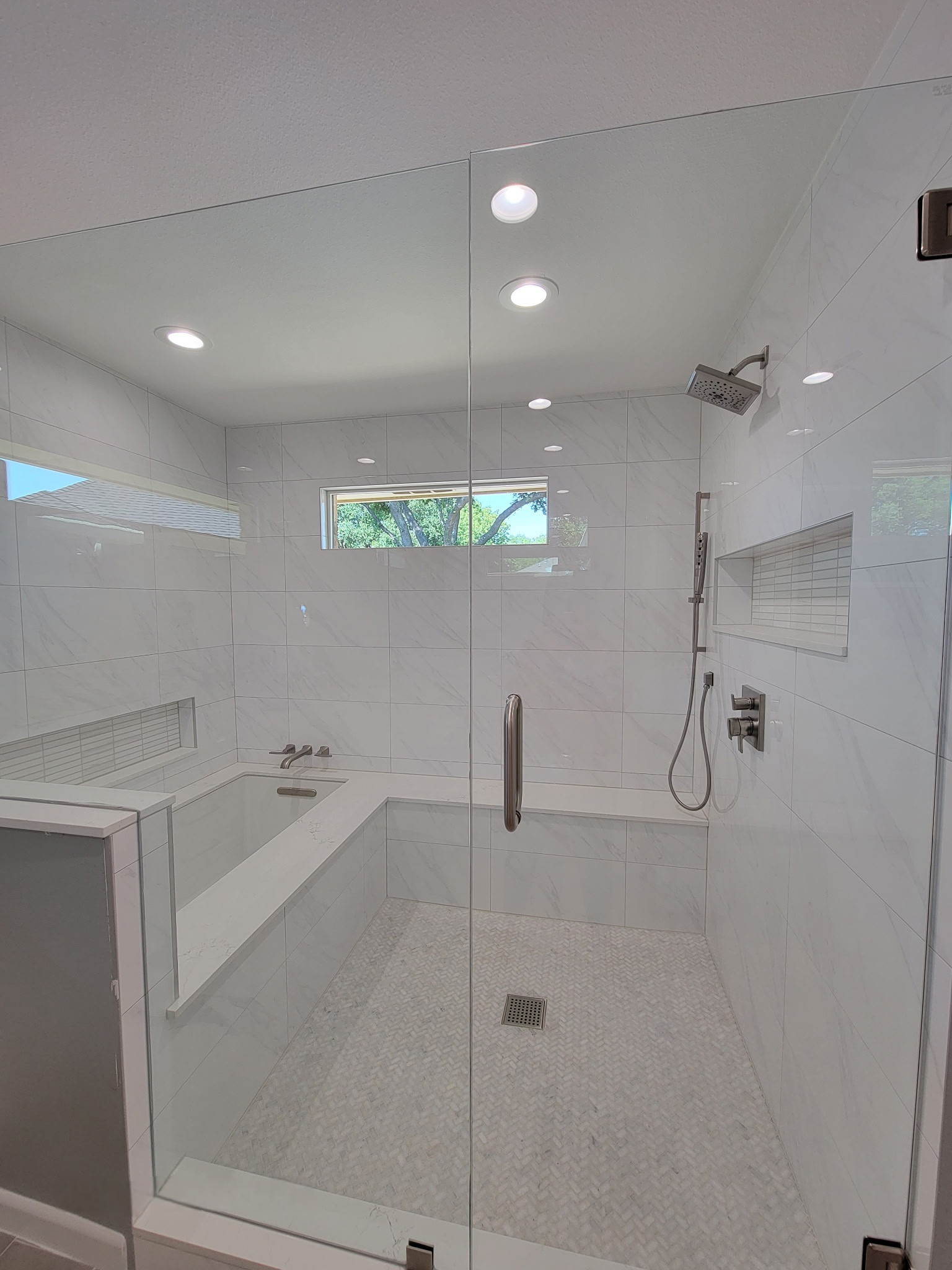Two separate bathrooms converted into a master bathroom with a big open closet