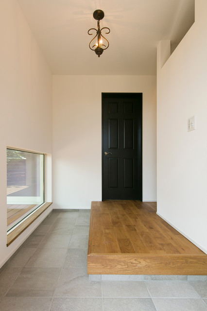 H様邸 moderno-ingresso