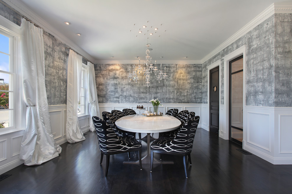 This is an example of a large transitional separate dining room in Los Angeles with grey walls and dark hardwood floors.