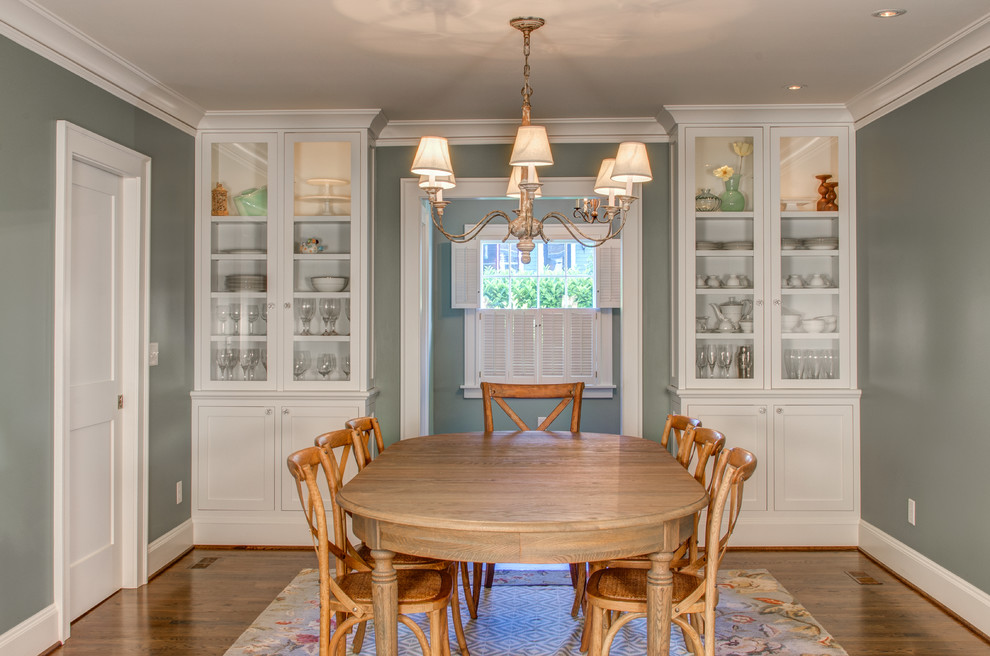 Photo of a traditional dining room in Portland with grey walls and dark hardwood floors.