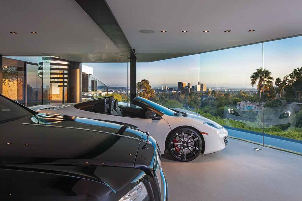 Inspiration for an expansive contemporary attached three-car garage in Los Angeles.