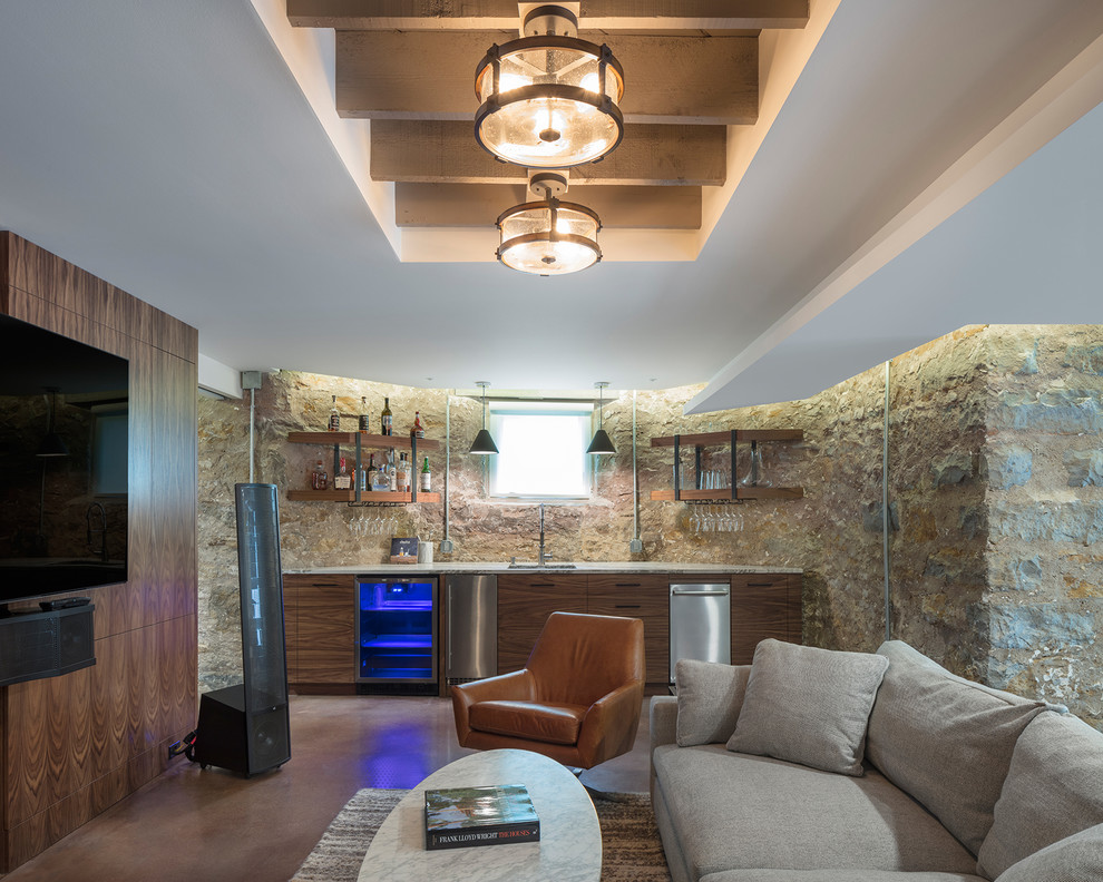 Mid-sized country basement in Kansas City with concrete floors and brown floor.