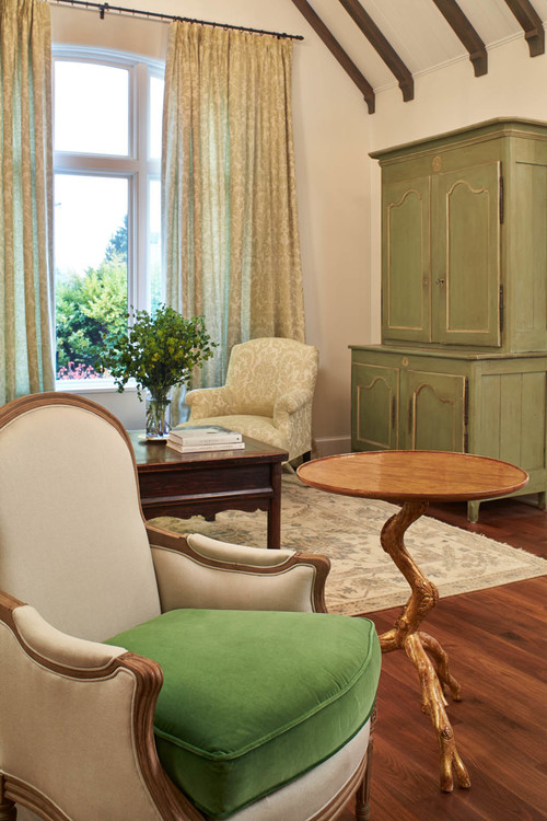 Green finishes add life and color to a neutral room.