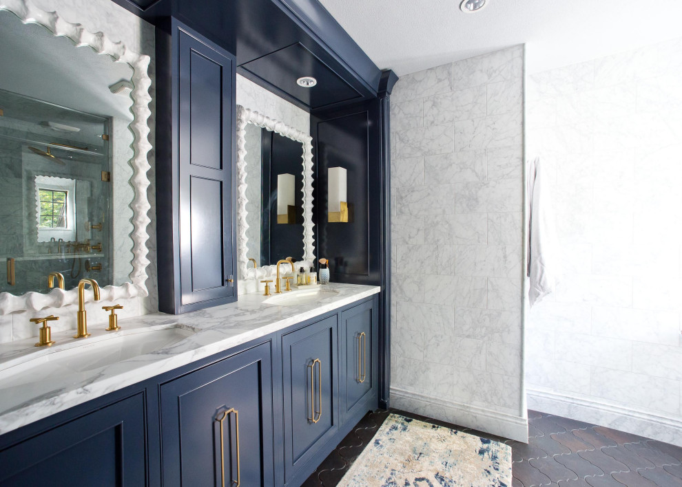 Elegant master white tile and marble tile black floor and double-sink bathroom photo in Chicago with flat-panel cabinets, blue cabinets, white walls, an undermount sink, marble countertops, white countertops and a built-in vanity