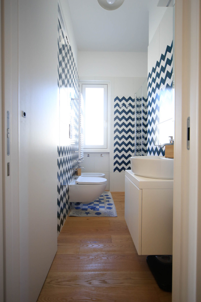 Design ideas for a beach style powder room in Naples.
