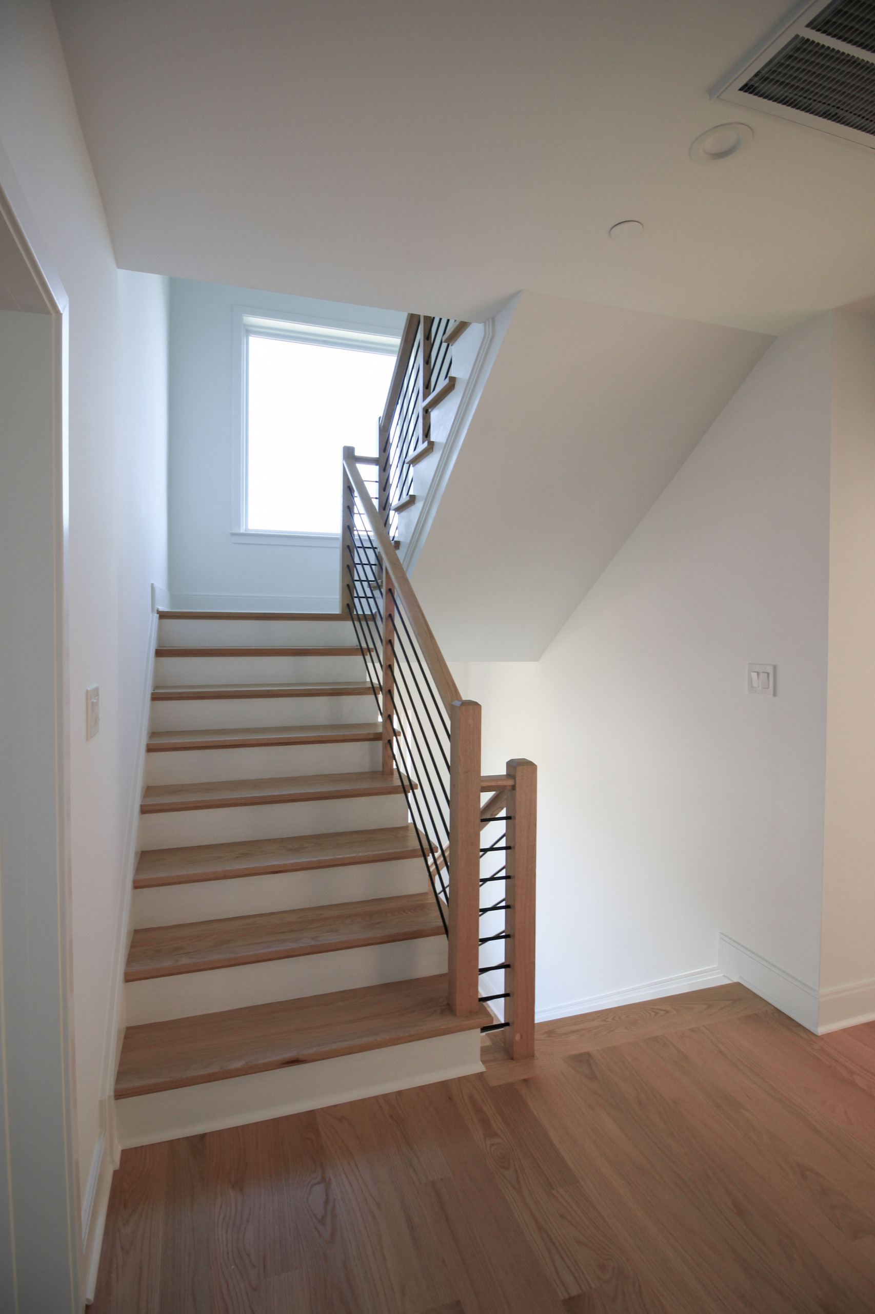 94_Neutral Color Floating Staircase with Metal Balusters, Bethesda MD 20817