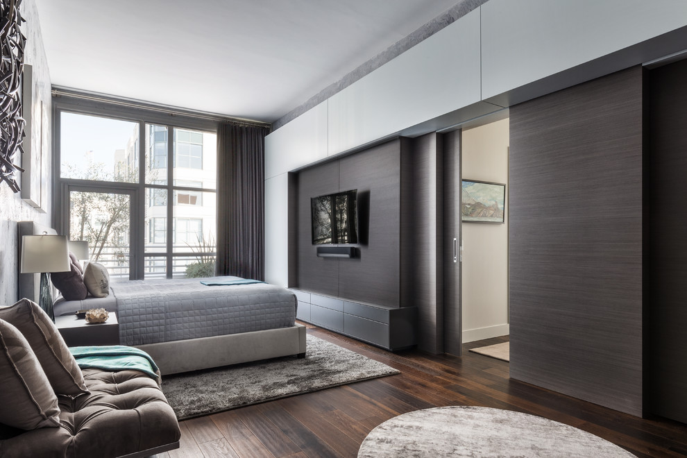 Photo of a mid-sized contemporary master bedroom in San Francisco with grey walls, dark hardwood floors and grey floor.
