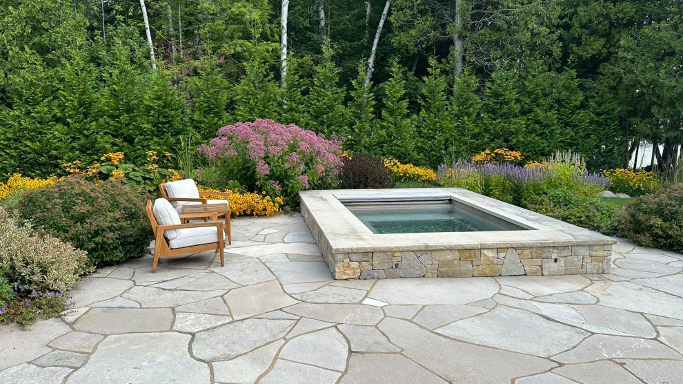 Inspiration for a transitional stone and rectangular pool remodel in Other