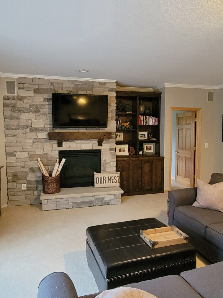 Custom built in shelving and mantle