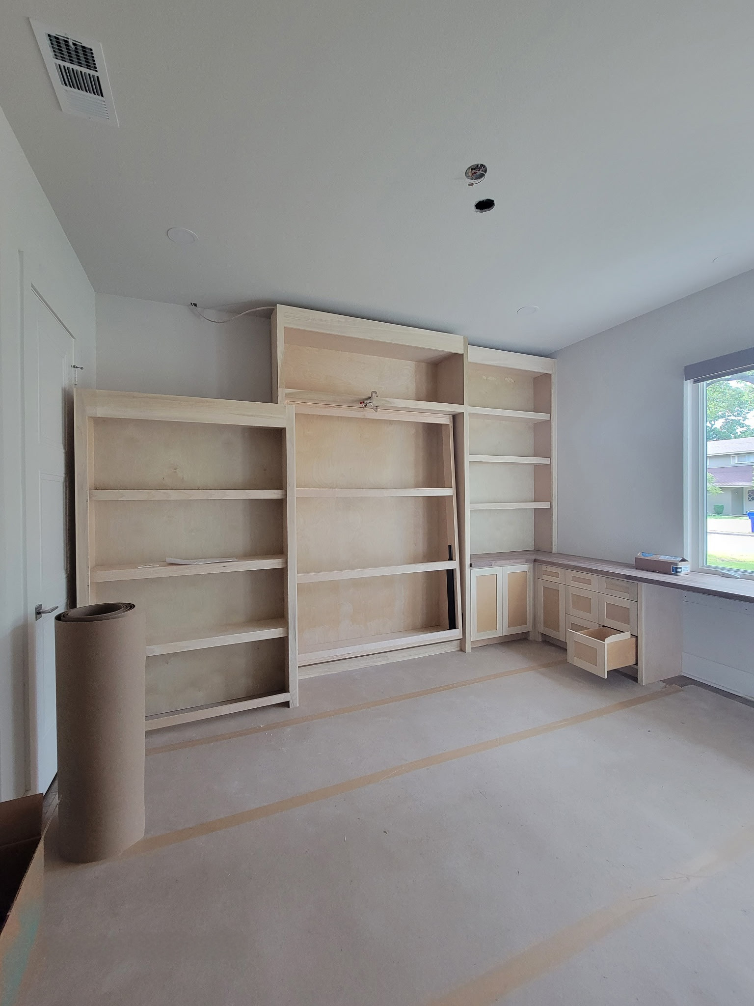 CUSTOM BUILT IN MURPHY BED / BOOKSHELF AND DESK