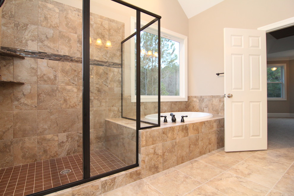 Large traditional master bathroom in Raleigh with an integrated sink, recessed-panel cabinets, white cabinets, solid surface benchtops, a corner tub, a corner shower, a one-piece toilet, beige tile, ceramic tile, brown walls and ceramic floors.