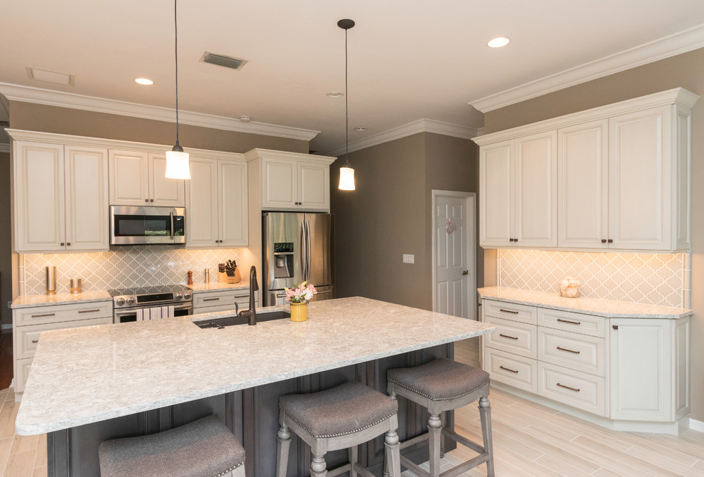 Example of a transitional kitchen design in Miami