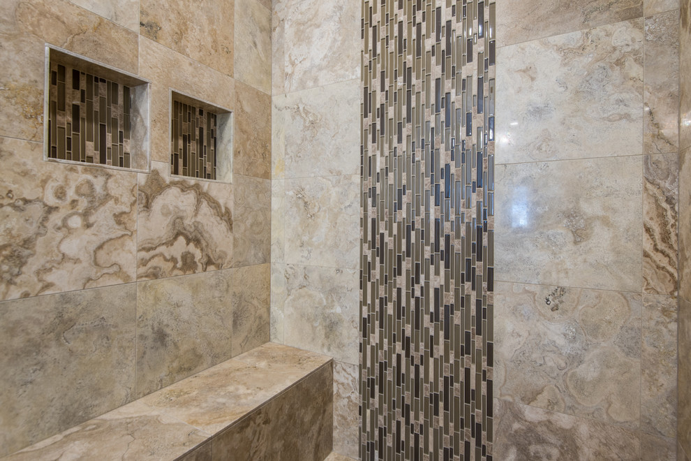 Inspiration for a mid-sized traditional master bathroom in Salt Lake City with raised-panel cabinets, white cabinets, a drop-in tub, a curbless shower, a one-piece toilet, beige tile, stone tile, beige walls, travertine floors, an undermount sink and granite benchtops.