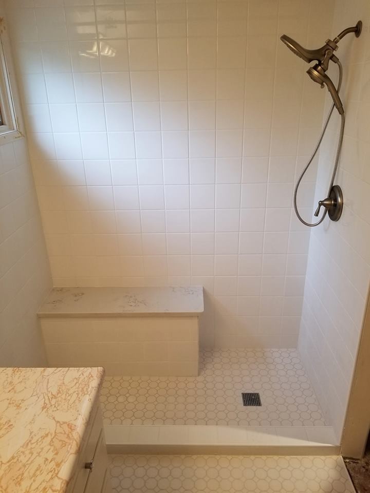 Inspiration for a small traditional 3/4 bathroom in Seattle with an alcove shower, white tile, ceramic tile, white walls, ceramic floors, granite benchtops, white floor, an open shower and beige benchtops.