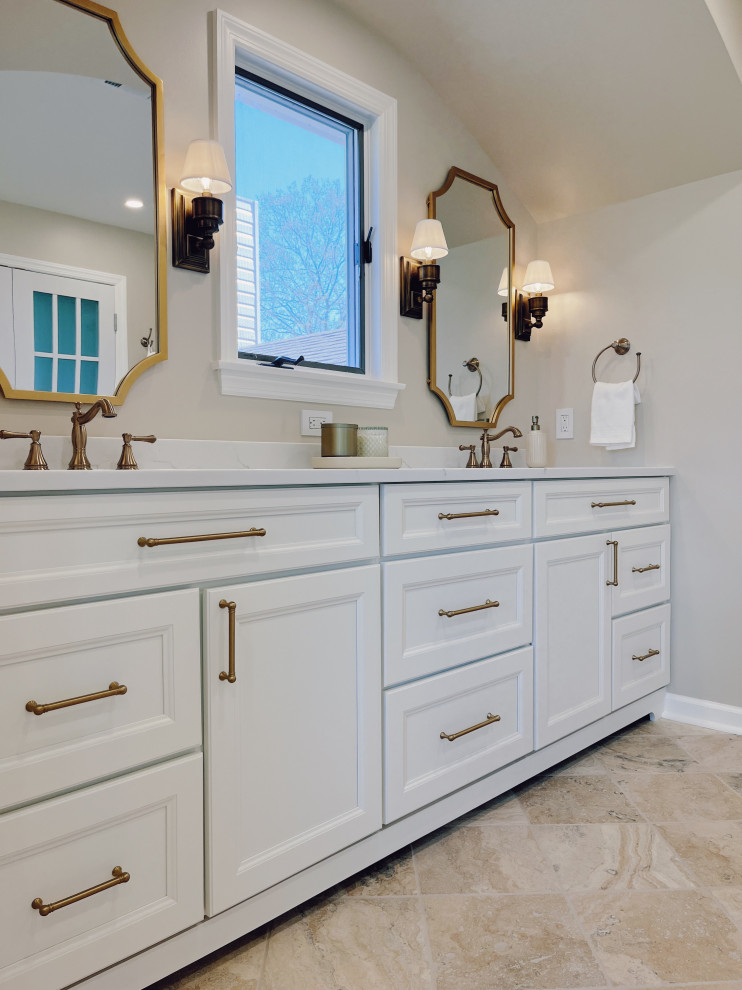 Inspiration for a large transitional master white tile and ceramic tile travertine floor, beige floor and double-sink freestanding bathtub remodel with shaker cabinets, white cabinets, a two-piece toilet, beige walls, an undermount sink, quartz countertops, a hinged shower door, white countertops and a built-in vanity