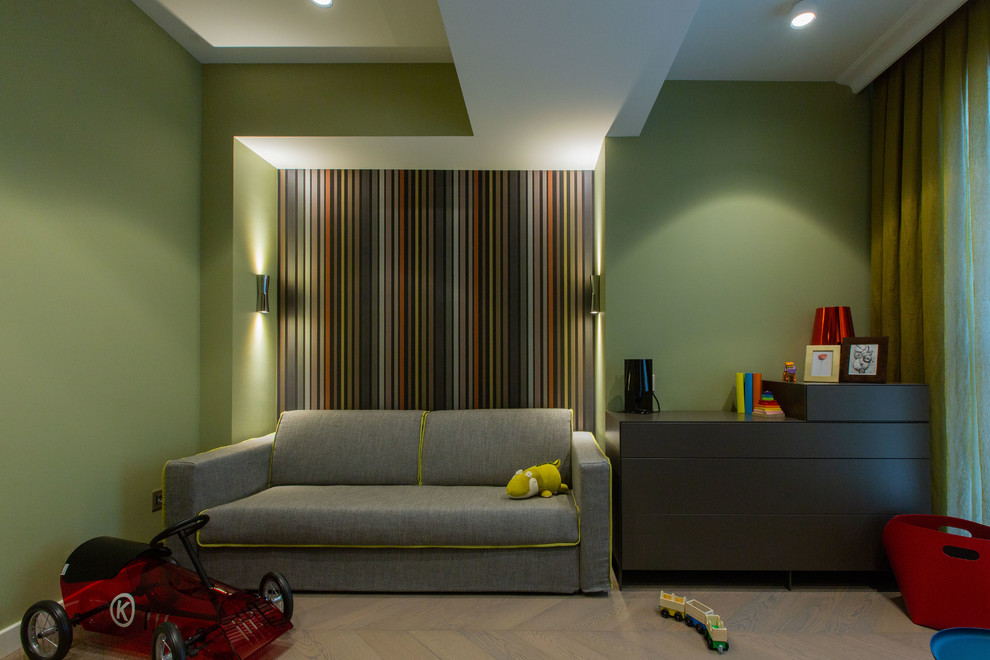 Mid-sized modern gender-neutral kids' room in Other with green walls, medium hardwood floors and brown floor.