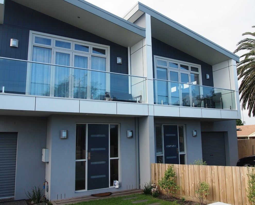 Photo of a modern two-storey grey exterior in Melbourne.