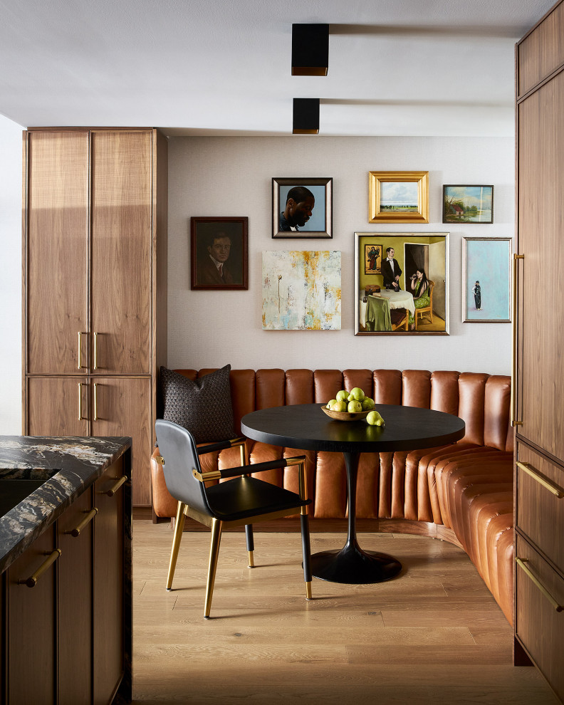 Trendy light wood floor and beige floor breakfast nook photo in Chicago with white walls