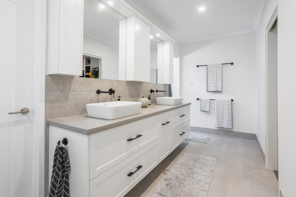 Photo of a modern bathroom in Perth with shaker cabinets, white cabinets, engineered quartz benchtops and grey benchtops.