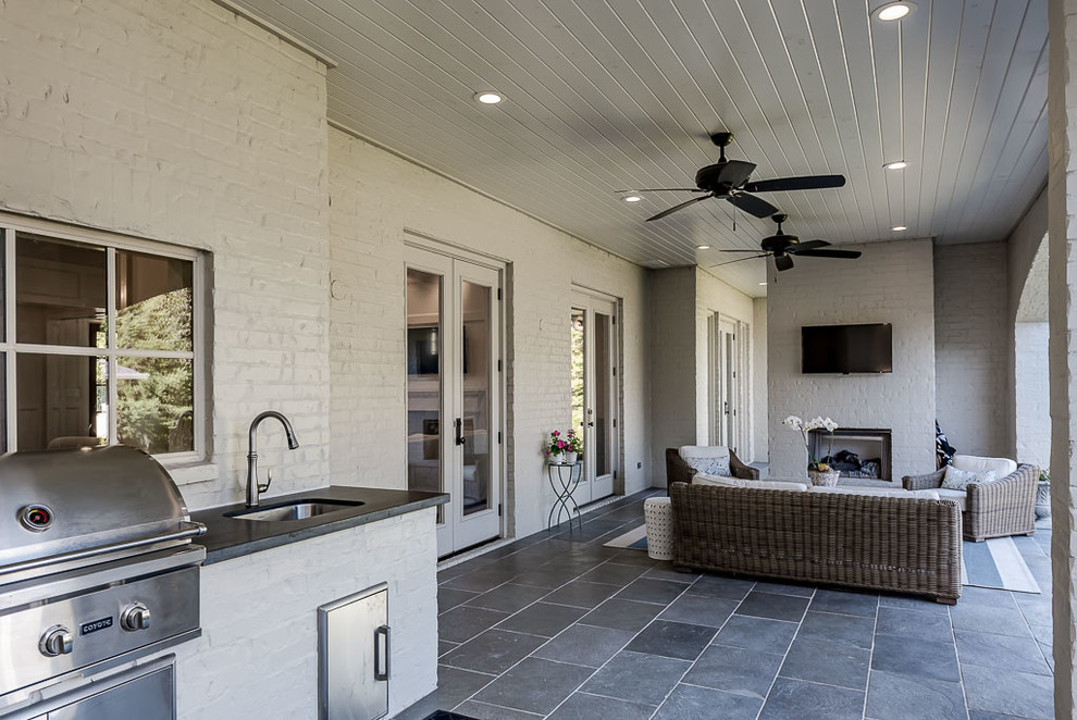 Example of a transitional home design design in Austin