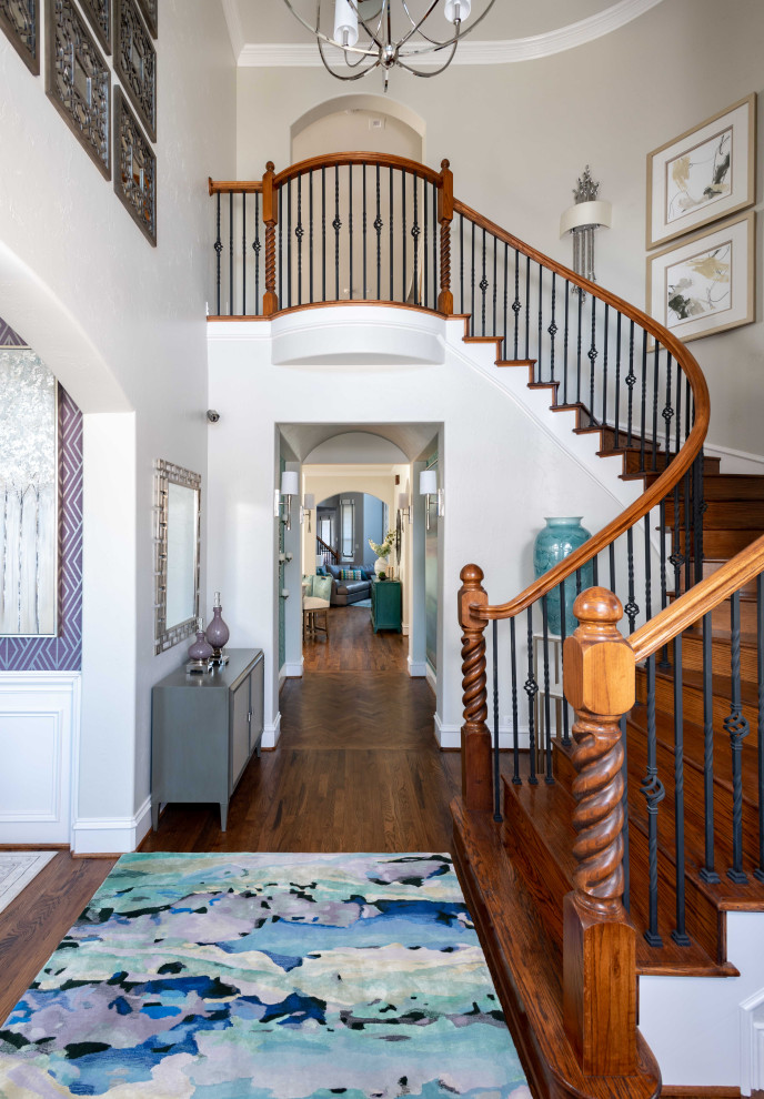 Inspiration for a mid-sized transitional medium tone wood floor and brown floor foyer remodel in Dallas with gray walls and a medium wood front door