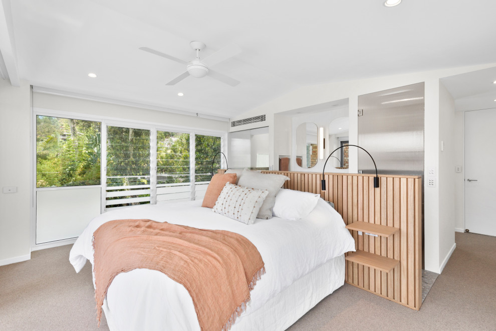 Photo of a large contemporary master bedroom in Sydney with white walls, marble floors, grey floor and vaulted.