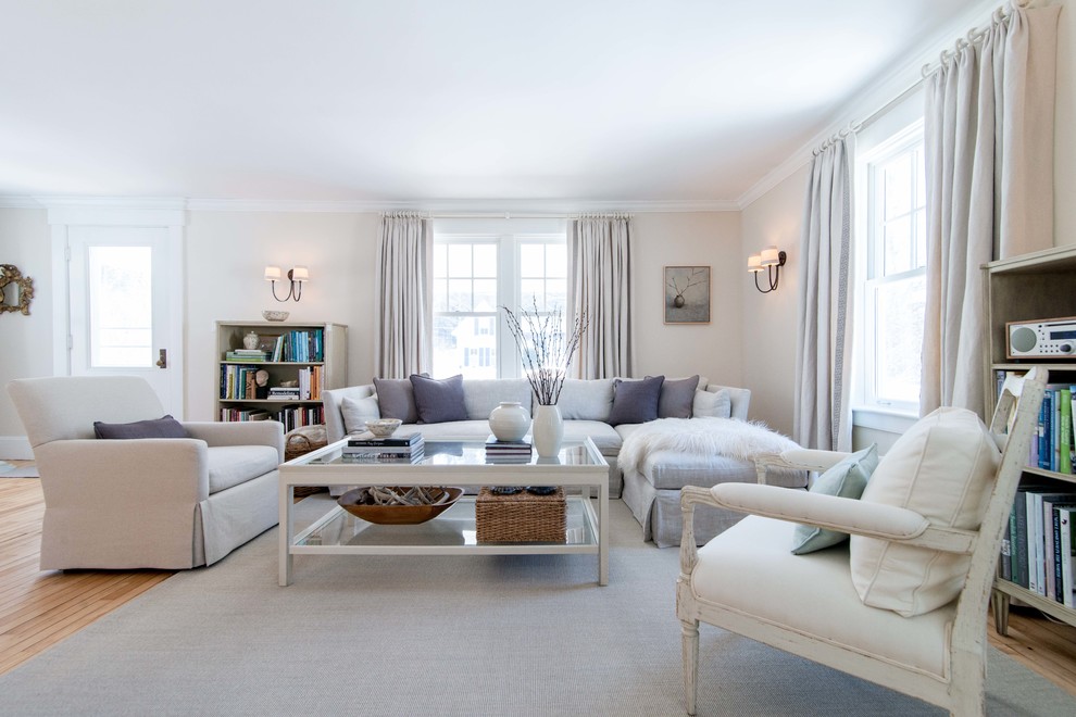 Living room - mid-sized traditional light wood floor living room idea in Burlington with beige walls, no fireplace and no tv